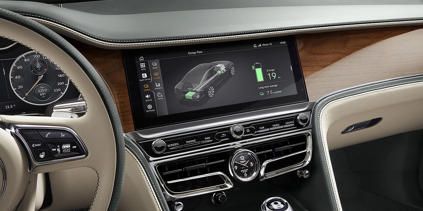 Bentley-Flying-Spur-Hybrid-front-cabin-featuring-touchscreen-and-Crown-Cut-Walnut-veneer