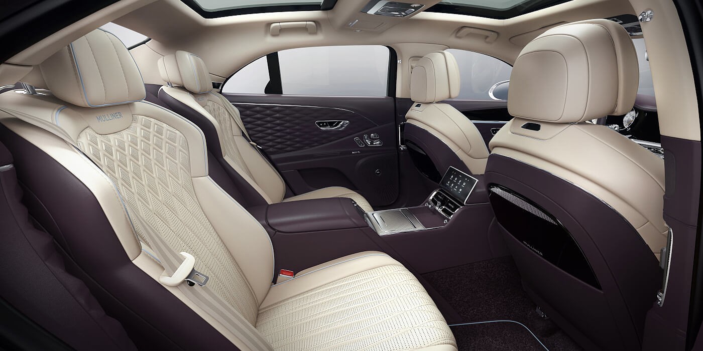 Bentley-Flying-Spur-V8-Mulliner-rear-interior-in-Portland-and-Damson-hides-and-3D-diamond-leather-door