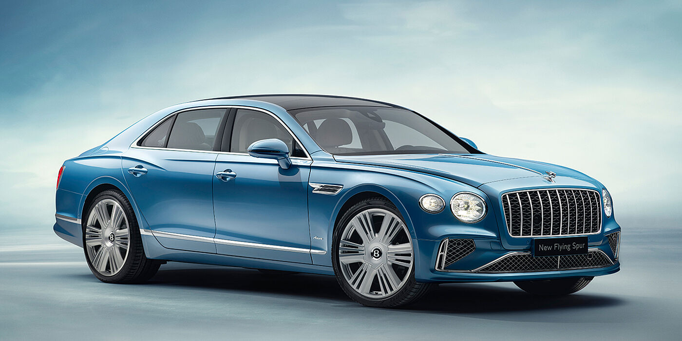 Bentley Yerevan New Bentley Flying Spur Azure sedan front view in Light windsor blue by Mulliner paint with 22 inch Azure wheels and chrome exterior details